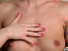 Naughty inked babe Ciren Verde's tits worshipped by girl