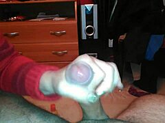 Cheeky handjob caught on sneaky vid