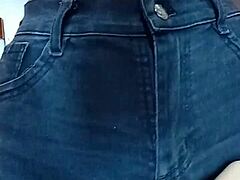 playing with a belt for pussy spanking