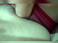 very horny latina puts dildo in her hairy pussy close-up masturbation.