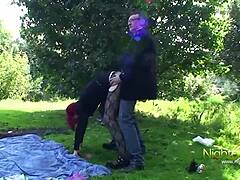 Redhead's public backside thrill