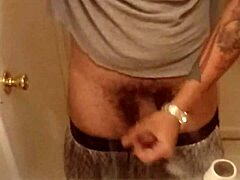 Showing off monster cock for camera