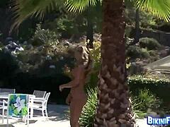 Busty solo play outdoors in bikini