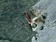 Beach Couple's Bold Intimacy