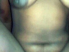 Qucky's oiled body and piercing stare in a hardcore scene