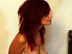 Lesbian prison guard teases redheaded prisoner for sex