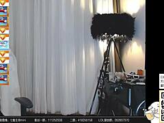 郭Mini Teases in a Sultry Asian Web Chat Session. Her Charm Keeps Viewers Hooked.