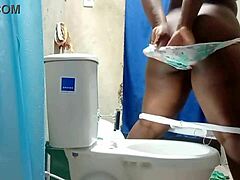 Why is my amateur camera catching the fat maid with her huge ass in my bathroom like this?