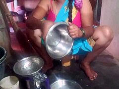 Indian sexy aunty cleans plates while teasing in the dorm