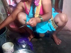 Indian sexy aunty cleans plates while teasing in the dorm