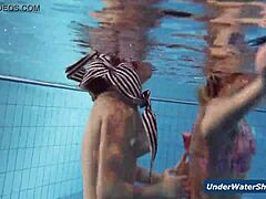 these horny czech girls start stripping each other down in the pool, getting all nude and playful underwater in their bikinis