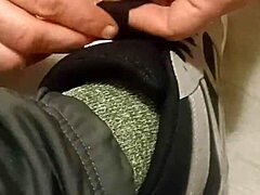 Detailed Scene of Friend Trashing Sneakers and Shoes with Feet Involved.