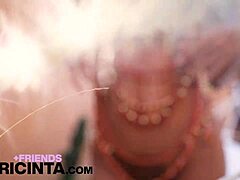 This horny asian babe putri cinta casually strips down to reveal her huge brown tits in a teasing display