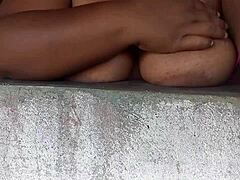 Curvy Woman Displays Her Large Natural Breasts At The Window For Passersby On The Street