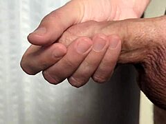 Amateur guy starts the day with a quick homemade cumshot solo masturbation in early morning close-up.