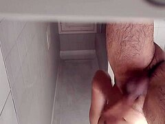 With very hot sun outside, the naughty guy masturbates alone in the bathroom for some quick relief.