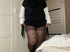 stepmom in hijab is showing off her pantyhose to stepson in a teasing way