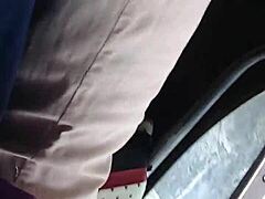 latina woman in skirt riding on the public bus