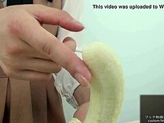 Watch this Asian girl crush a banana by hand in intense fetish style!