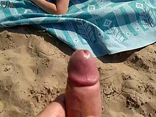Big dick guy explodes with massive cumshot near nude beach milf.