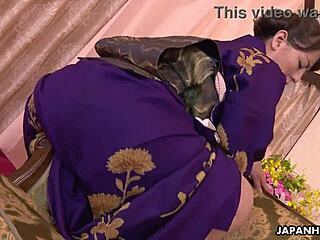 Japanese Ryouko Murakami masturbates with bottle in kimono uncensored