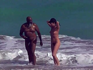Hairy wife flirts by the shore