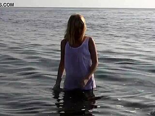 Blonde Teen Strips Naked By The Sea