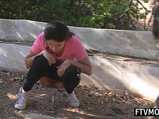 two milfs pissing in public park