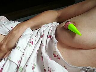 Nippleringlover’s Alluring Milf Inserts Sticks In Stretched Nipples
