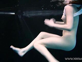 Andrejka's daring nude pool swim