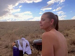 Ginger B tanning nude in desert sun