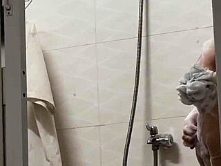 Asian Beauty Glows in Shower Scene