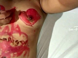 Amateur Asian girl paints naked body