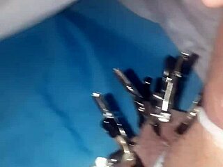 Teasing cock with clamps all over