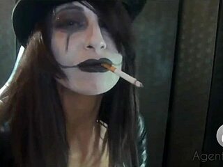 Goth babe’s smoking fetish fuels daring tit tease