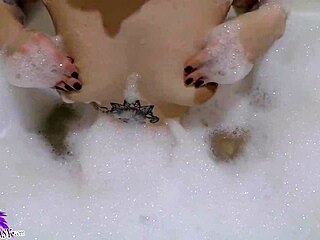 Cute babe sloppy sucking huge dildo in bath