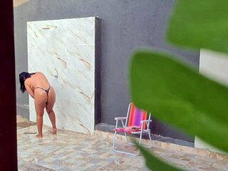 i caught my stunning neighbor showering outside after beach