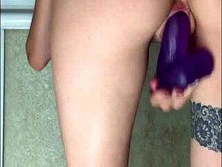 I watched her dildo play by window