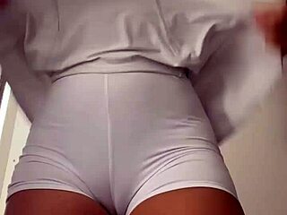 Esposa Heyya changing clothes in shopping mall fitting room, watch full on red