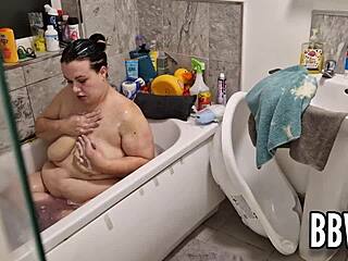 Pervert Spies On BBW Washing Giant Floppy Tits.