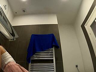 just caught my skinny brunette babe teasing in the bathroom with her pink mini skirt and sexy legs