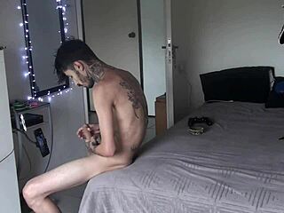 Dark-haired guy chats on video call with his obedient sub