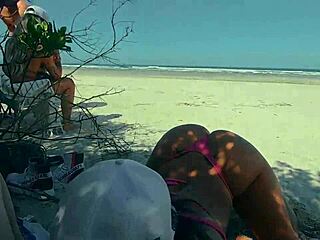 Amigas enjoy wild sex on a crowded beach in public