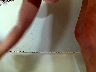 Liza gets cumshot and golden shower in wild tub scene.