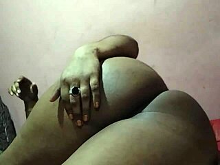 Indian hairy woman pleasing herself in hotel room