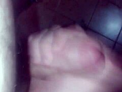 guy secretly jerks off in the bathroom, hiding his solo pleasure