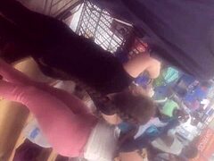 spanish european chick with a bubble butt walks around casually