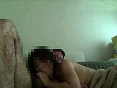 I love watching this Asian babe with big tits sucking cock