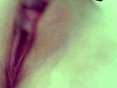 wife fingers her pussy while masturbating