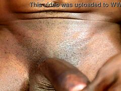 naija ebony masturbates her pussy over big black cock